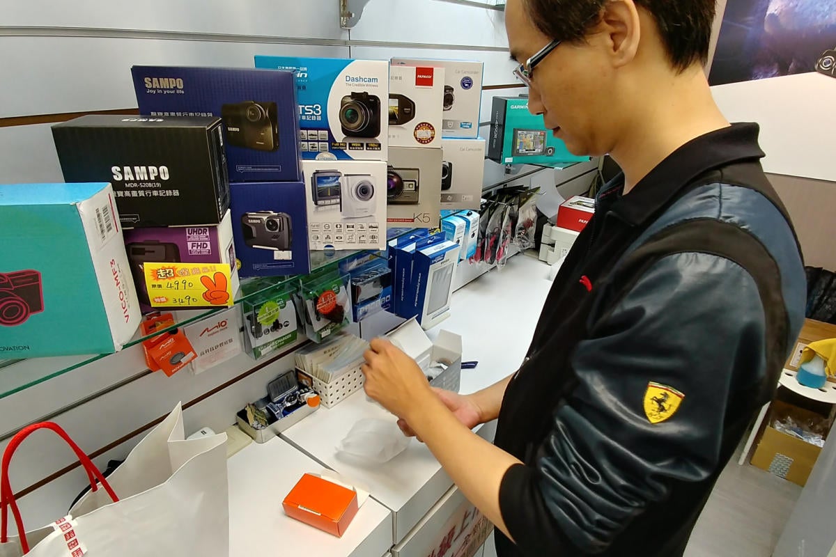 Shopkeeper works on a product