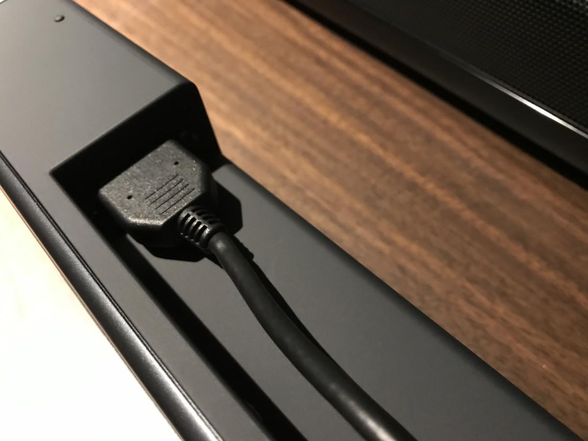The Onkyo’s connection cable fits neatly into the rear of the sound bar.