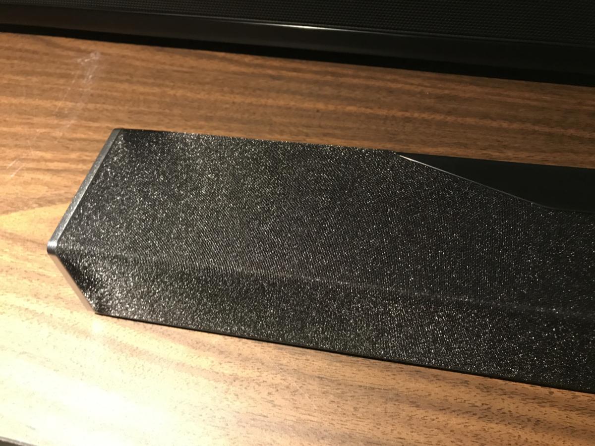 Unlike most sound bars, the Onkyo has a cloth covering on top of thespeaker to hide the two upfiring