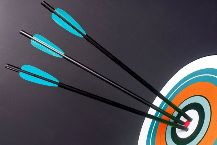 bullseye target with 3 arrows