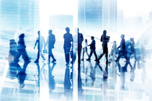 abstract image of business silhouettes in blurred motion