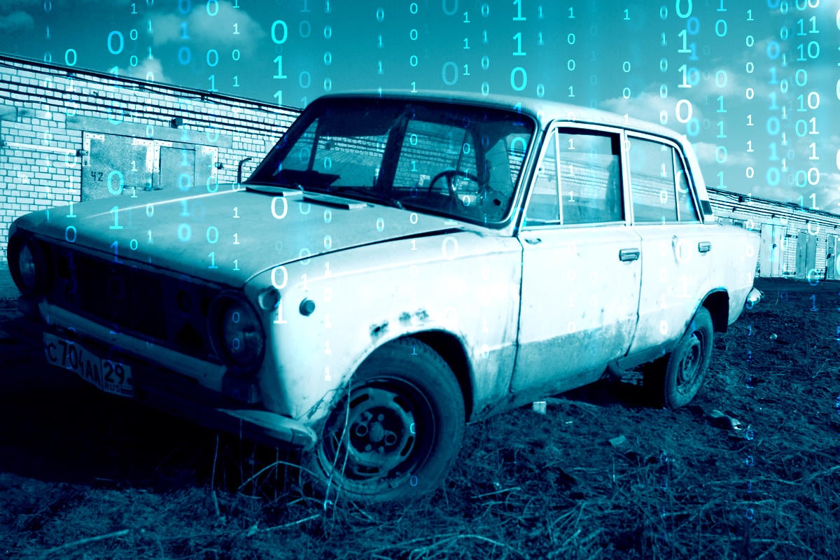 old car in need of repair with binary numbers in background