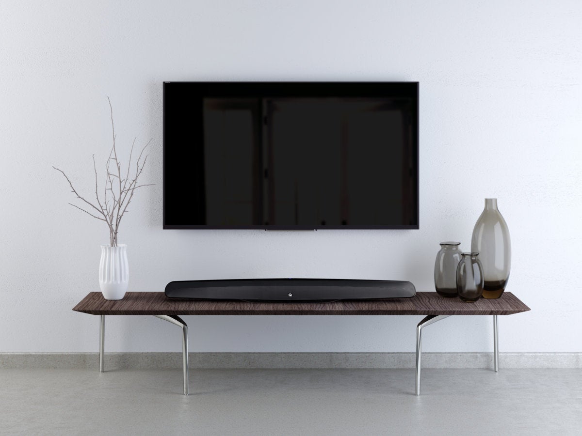 The M3 sound bar can be mounted on top of a table or inside a cabinet.