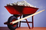 red wheel barrow pile of money high paying salary