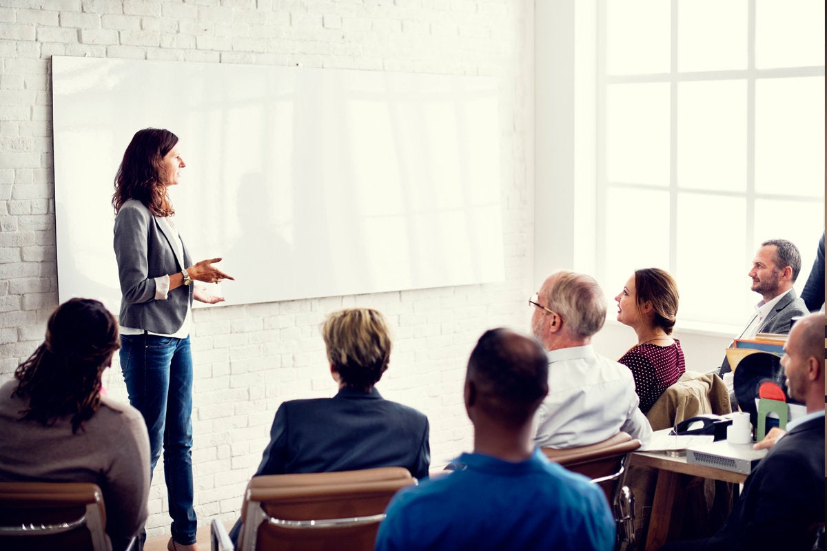 woman teaching class presentation collaboration