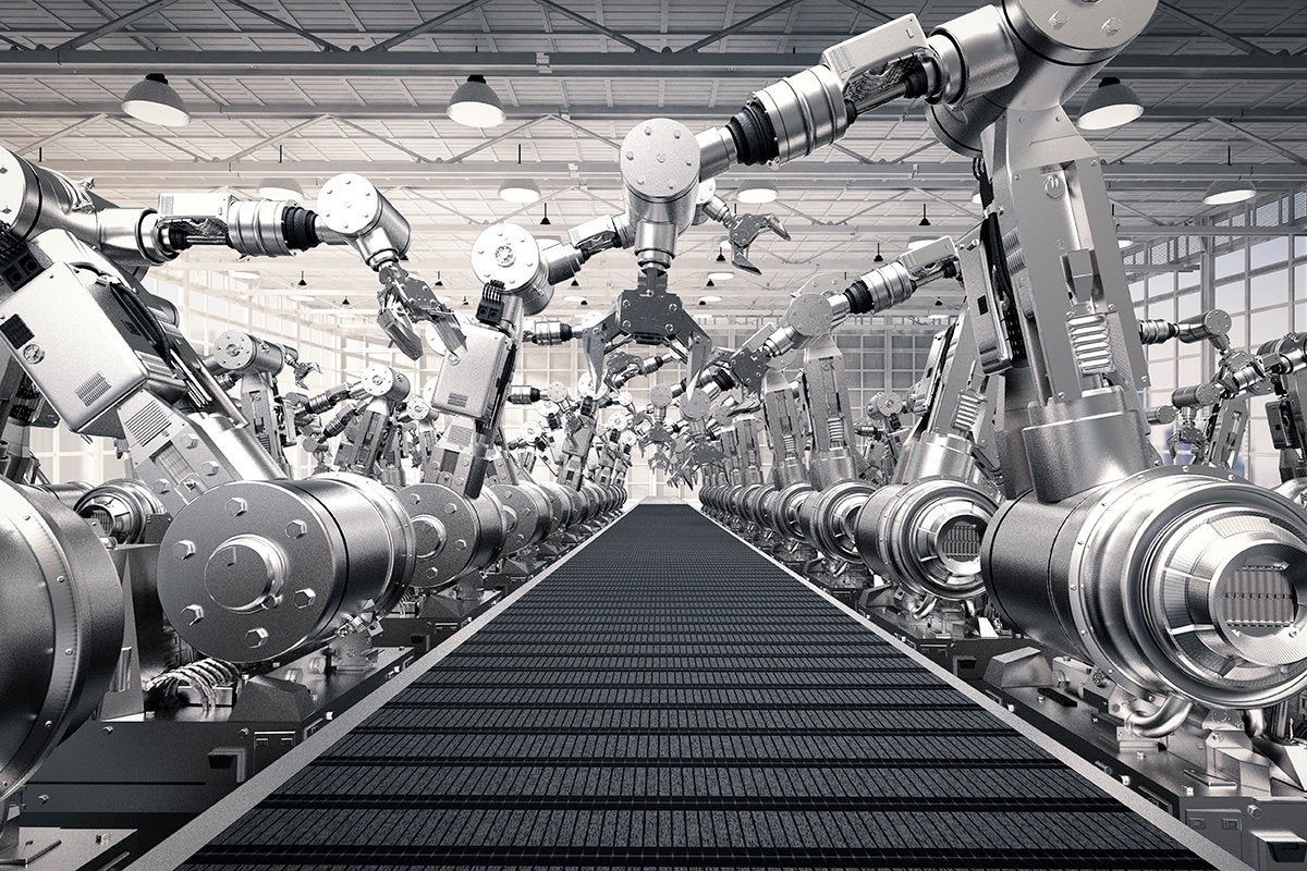 automated assembly line of robotic arms  and a conveyor belt