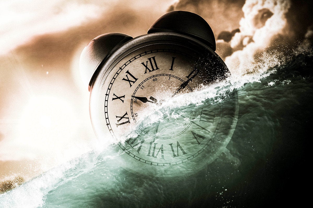 a clock half-submerged in water