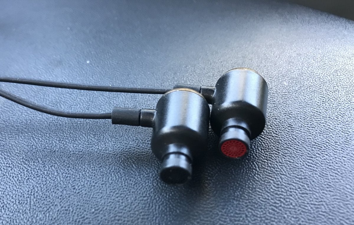 Right and left is designated by the color of the headphone grille. Ear tips removed for clarity.