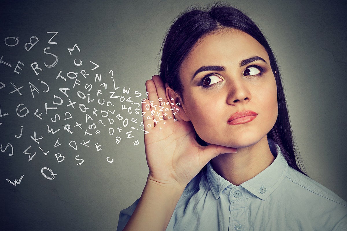 Conceptual images of a woman listening to a stream of abstract letters.