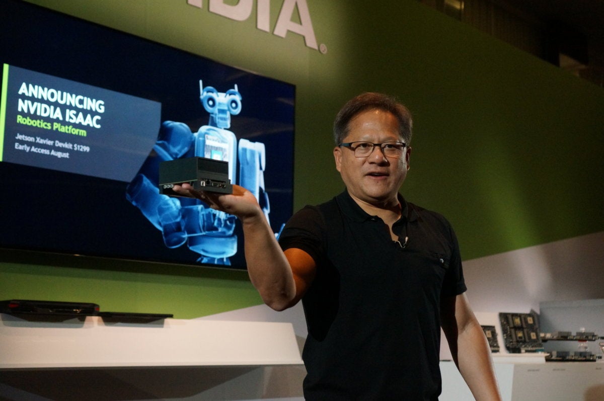 Nvidia CEO Jensen Huang holds a Jetson Xavier