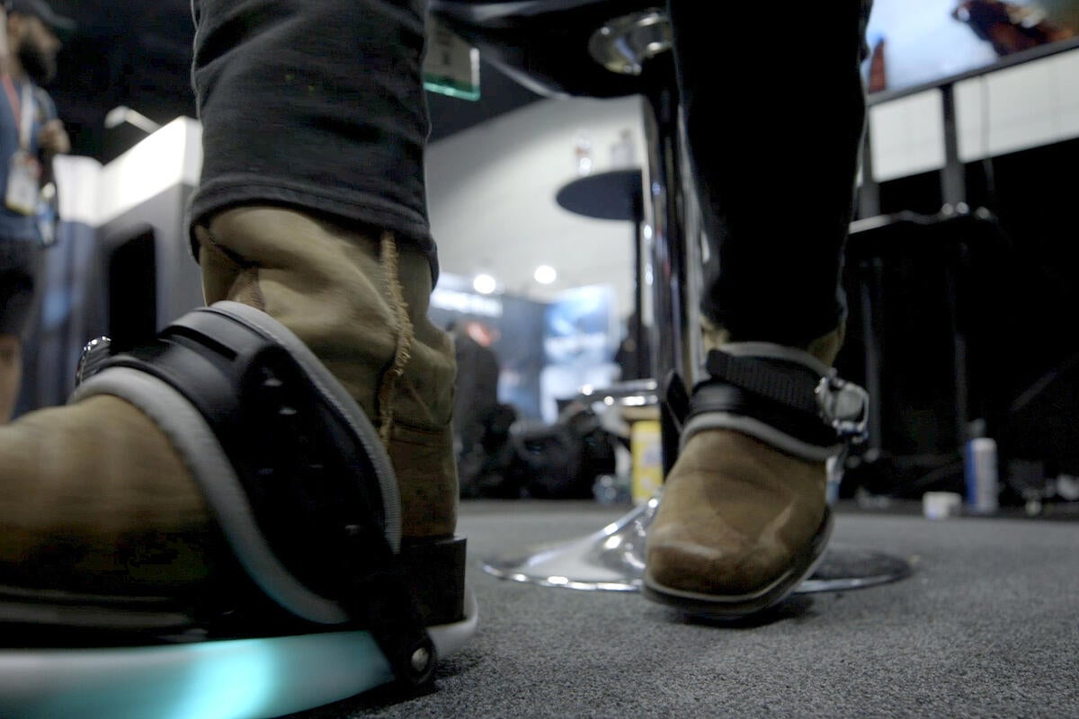 photo of Cybershoes let you physically run through virtual reality from the comfort of your chair image