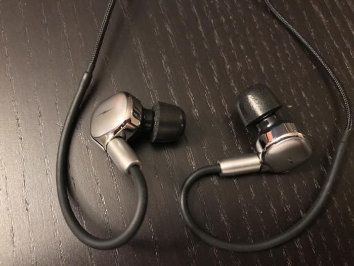 Detail view of the Canfield Pro IEMs with nylon braided, MMCX detachable cable.