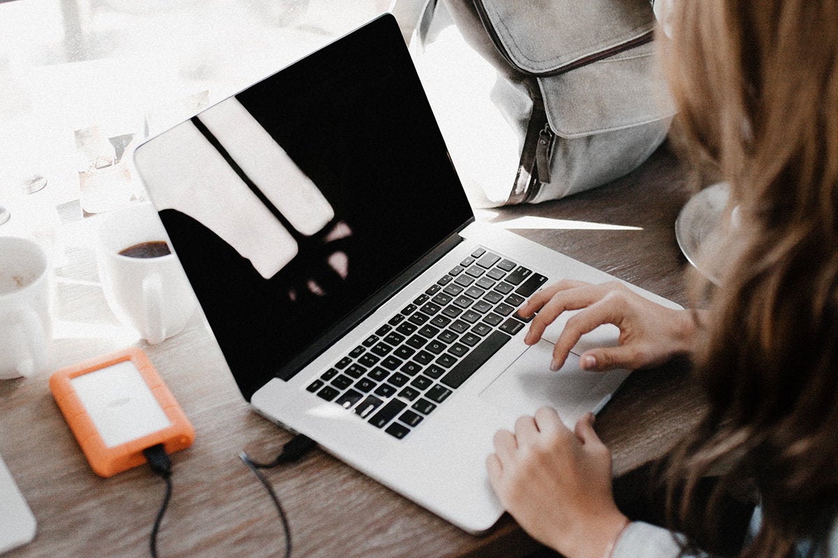 laptop / hard drive / workspace