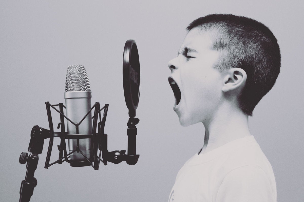 sing yell announce microphone boy shout communicate perform by jason rosewell unsplash