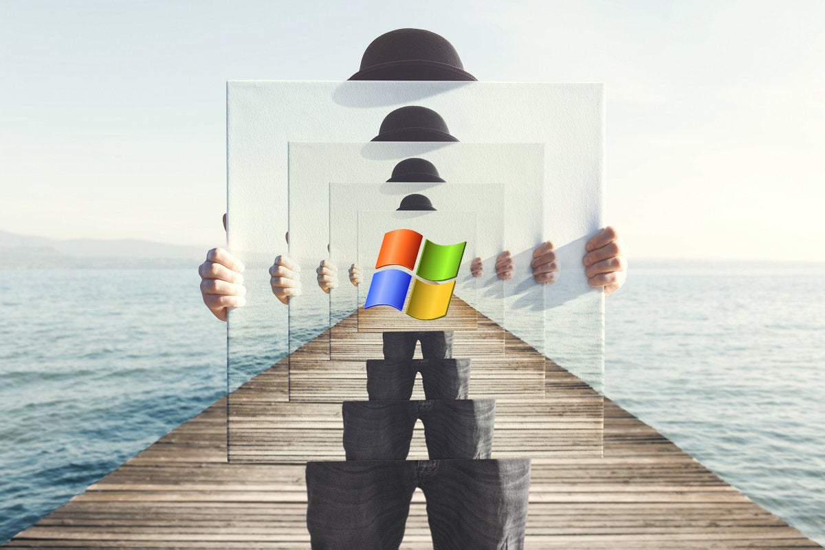 windows 7 logo on mirrors man with derby hat on dock