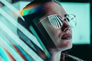 women in it programmer devops reflection monitor glasses by angelos michalopoulos unsplash