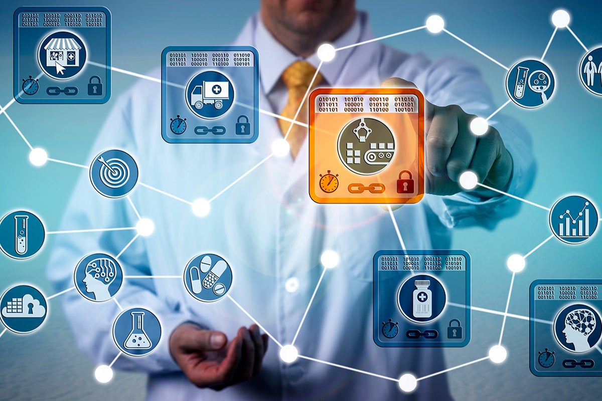 blockchain in healthcare / doctor accesses one block in a chain of digital medical records
