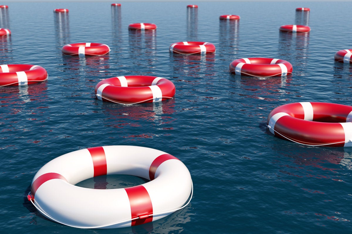 red buoys floating in the ocean unique life preservers safety risk float 100779382 large
