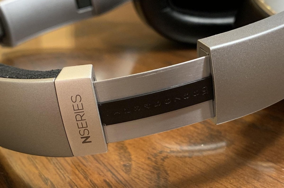 The metal click-stop adjustable headband.