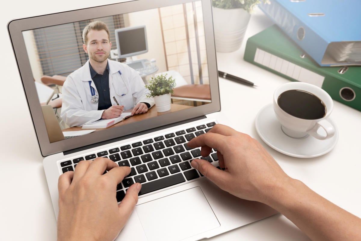 health telemedicine laptop doc