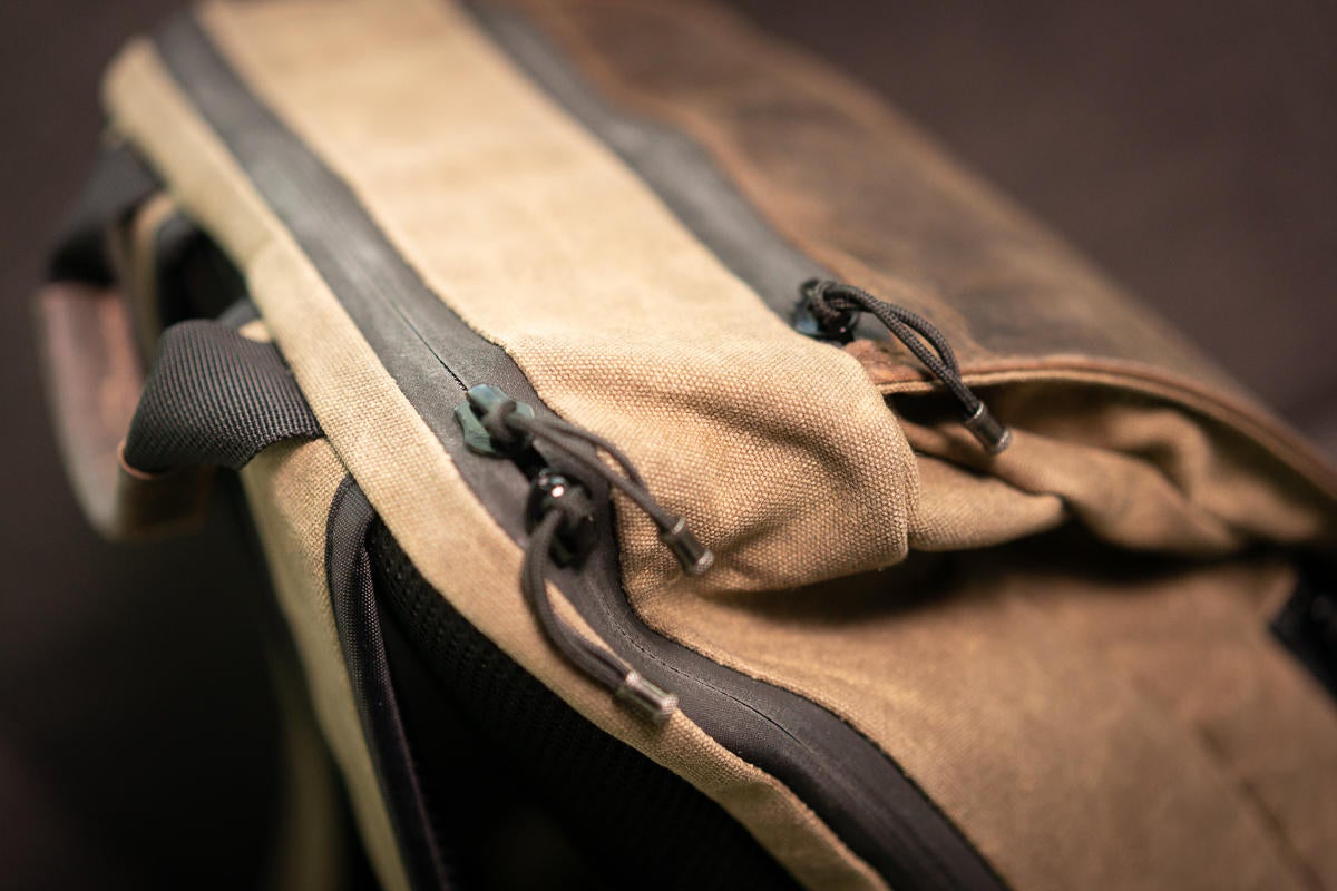 sutter slim backpack zippers