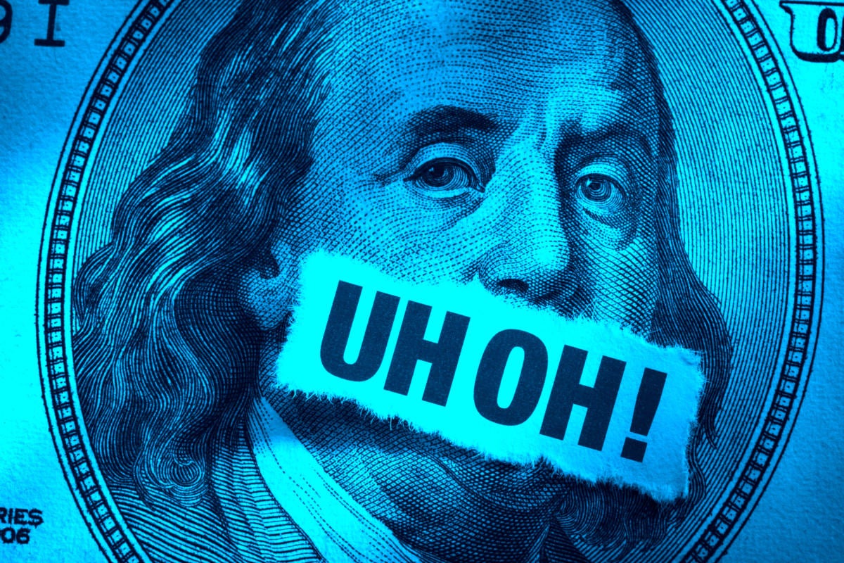 CSO  >  Money trouble  >  A one hundred-dollar bill with 'UH OH!' across Benjamin Franklin's mouth.