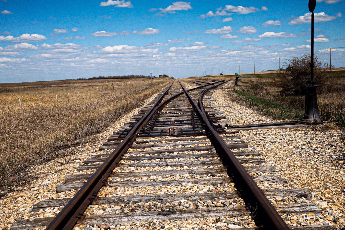 derailed railroad track merge split crossroad shift align by faiz prasia unsplash