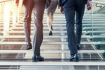 executives on the move stairs career promotion upward steps