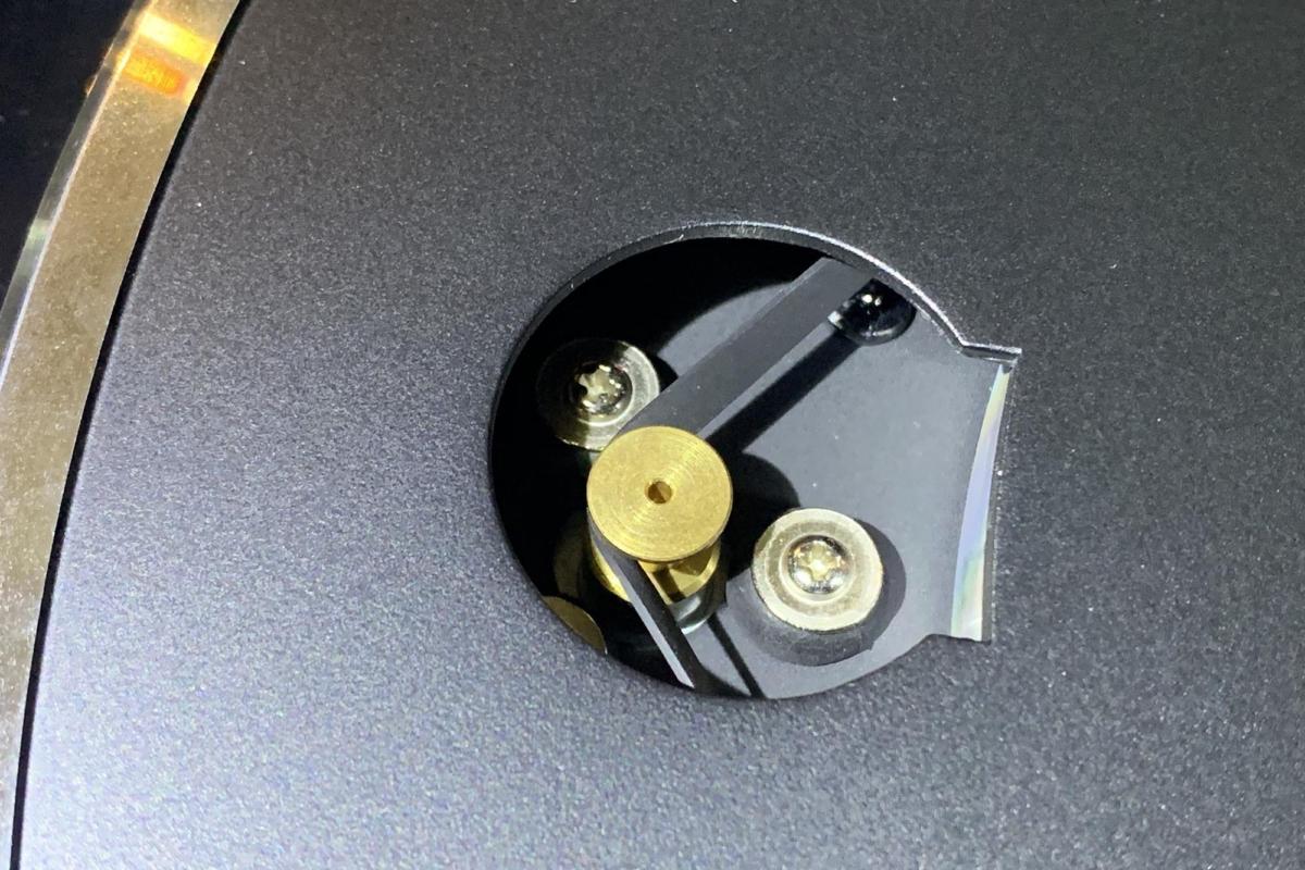 The Vinyl 500 is a belt-driven design. You slip the belt onto the motor through a hole in the platte