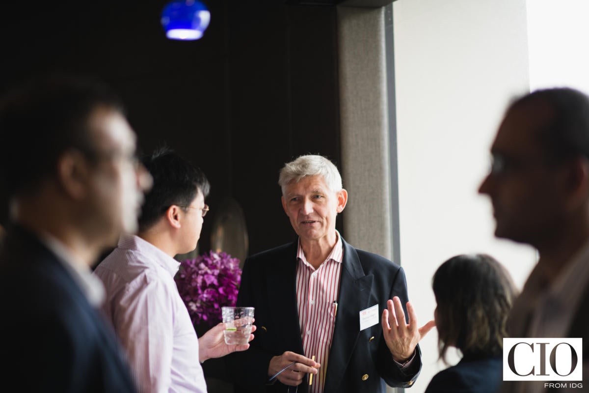 Prof Christian Wagner of the City University of Hong Kong speaking with guests during the welcome drinks.