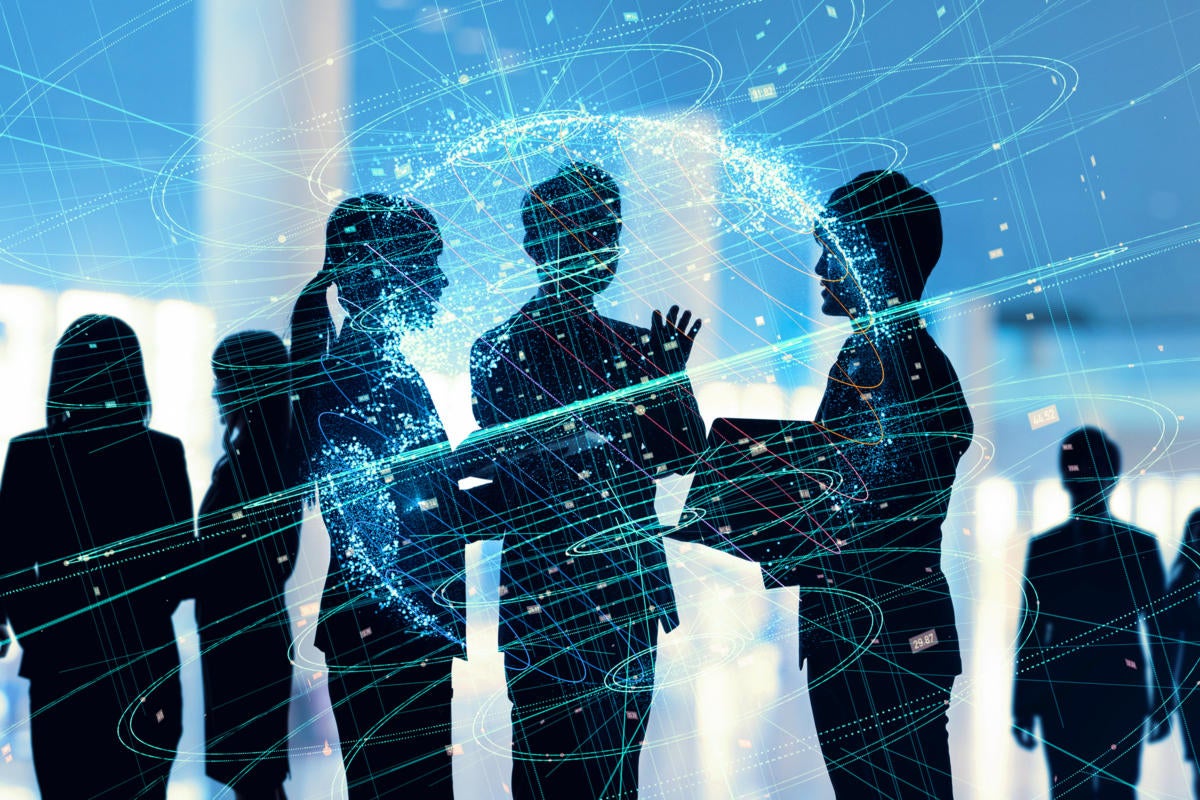 Conceptual image of executives; silhouettes in motion with a virtual global network overlay.