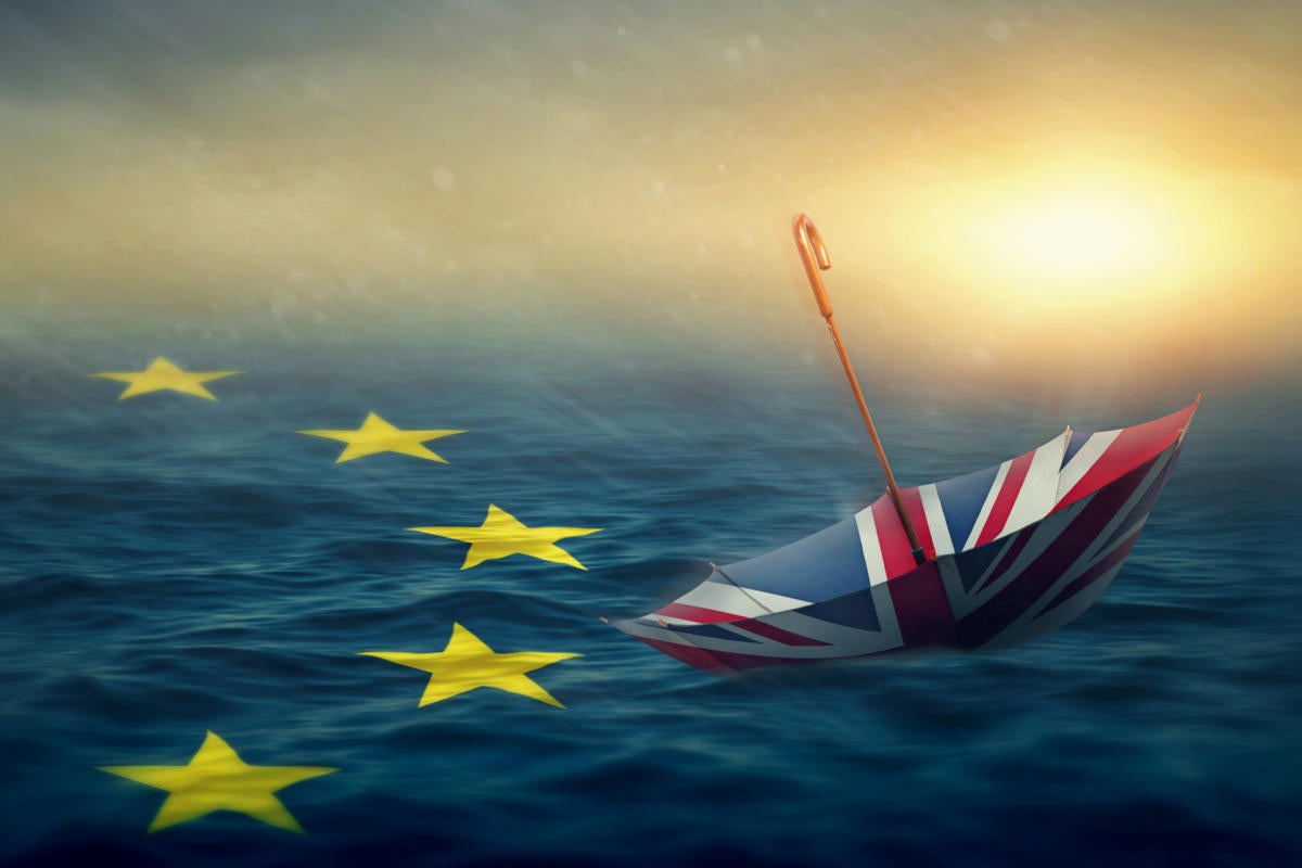Adrift  >  United Kingdom | UK umbrella floats on a sea branded with the European Union | EU flag