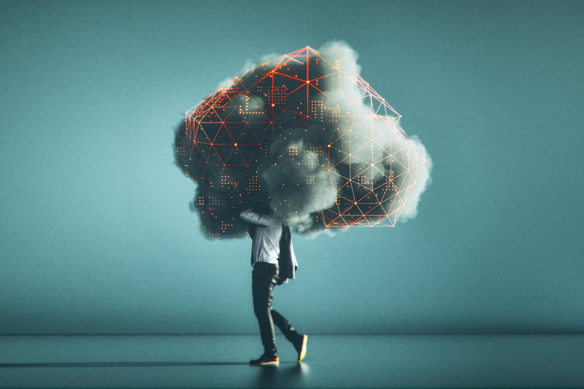 A man with his head in a complex, complicated cloud.