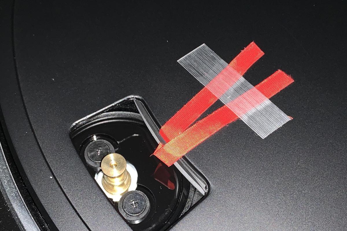 Attaching the belt to the drive mechanism is easy through the rectangular slot in the platter.