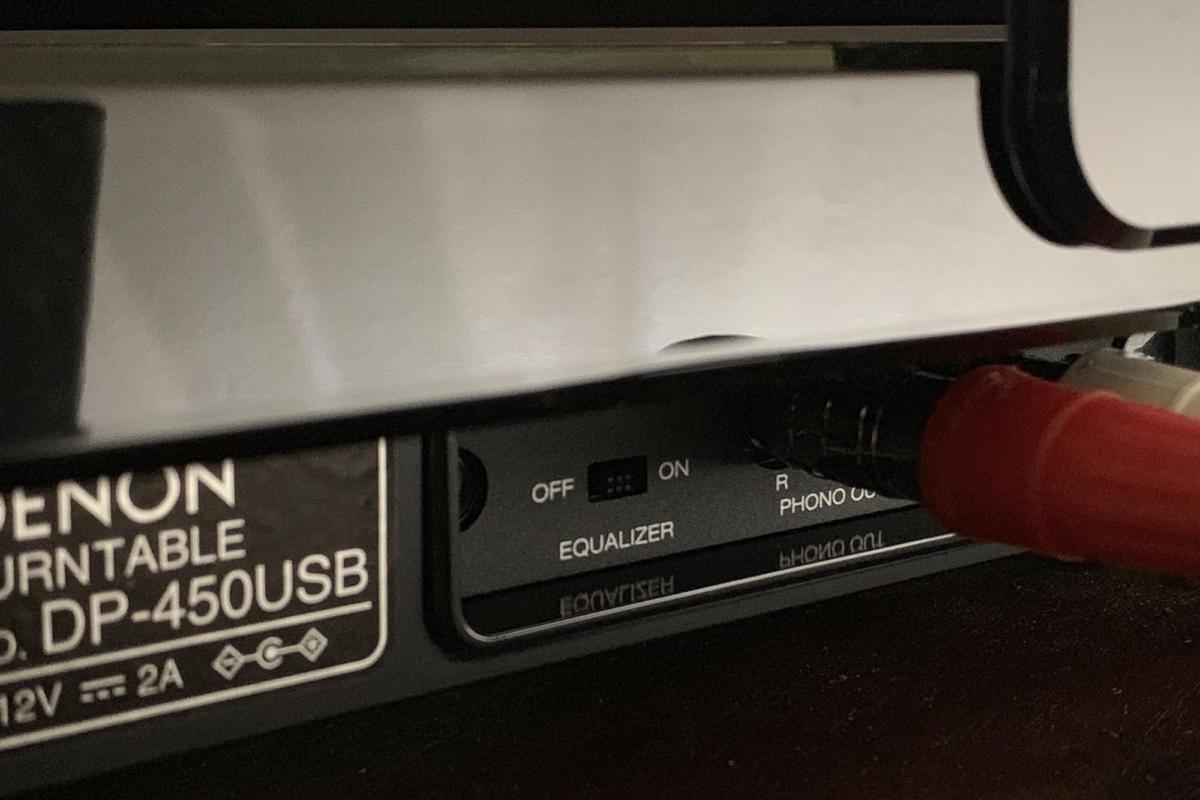 The Denon comes with an internal phono preamp. You can defeat the internal preamp and use an externa