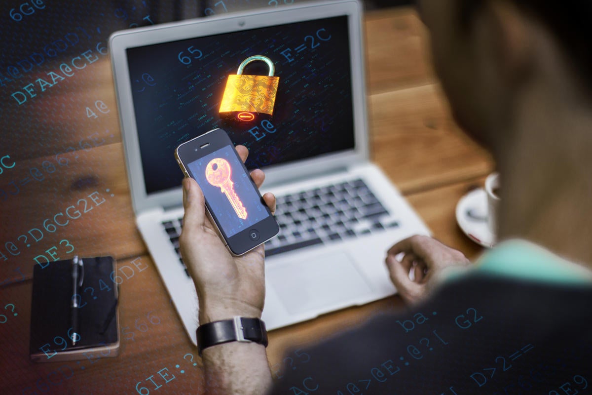 Multifactor authentication > A mobile phone displays a digital key to a lock on a user’s laptop.