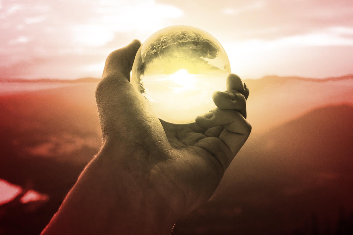 prediction predict the future crystal ball hand holding crystal ball by arthur ogleznev via unsplash