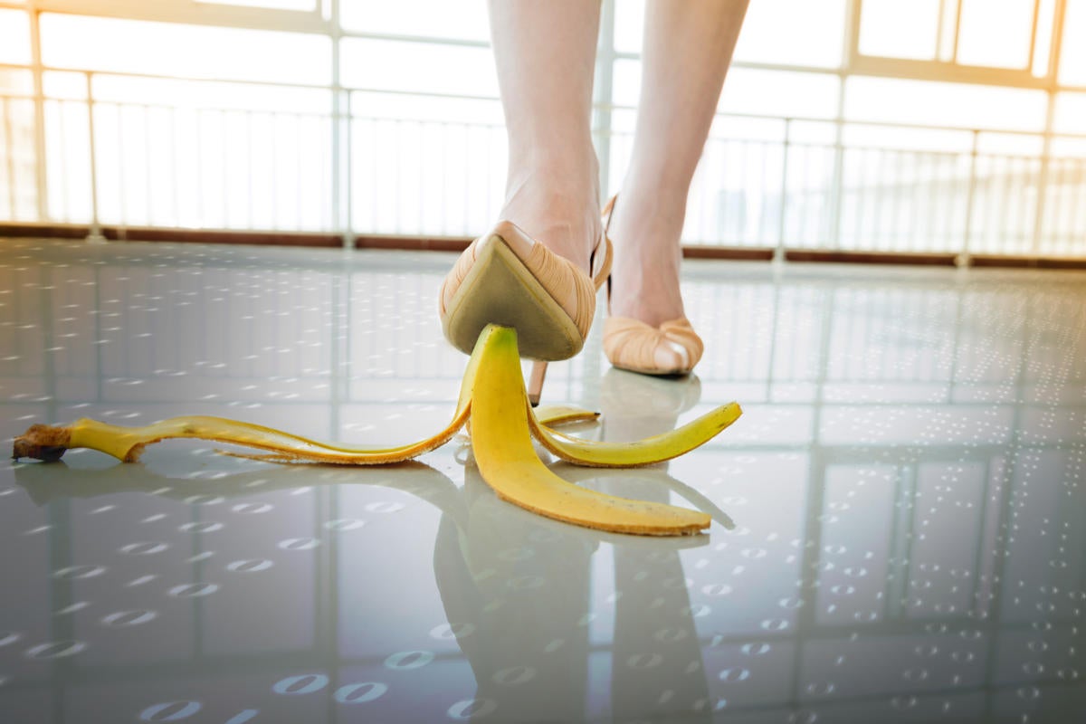 businesswoman about to step on a banana peel risks mistakes vulnerabilities by baona gettyimages 635792860 binary by gerd altmann cc0 via pixabay 2400x1600 100814146 large