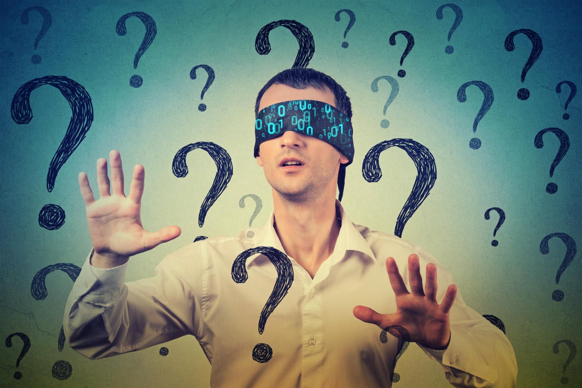 Cybersecurity awareness  >  A man with a binary blindfold finds his way through question marks.
