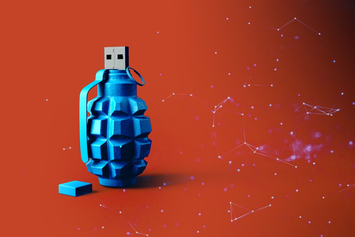 security threat / danger / attack / warfare / grenade-shaped flash drive with abstract connections