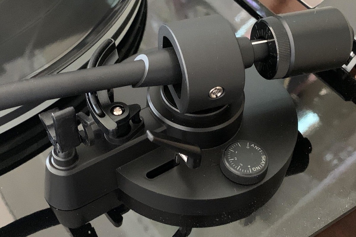 Detail view of the tonearm and anti-skate dial.