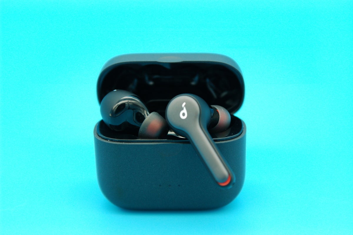Liberty Air 2 true wireless earbuds one hanging off case