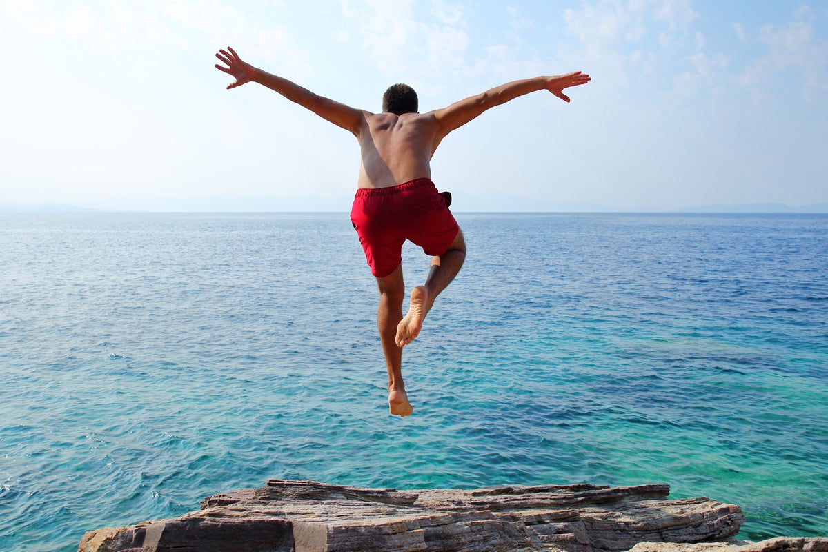 cliff diving taking the plunge dive into a project ocean swimming by aydinmutlu getty 2400x1600