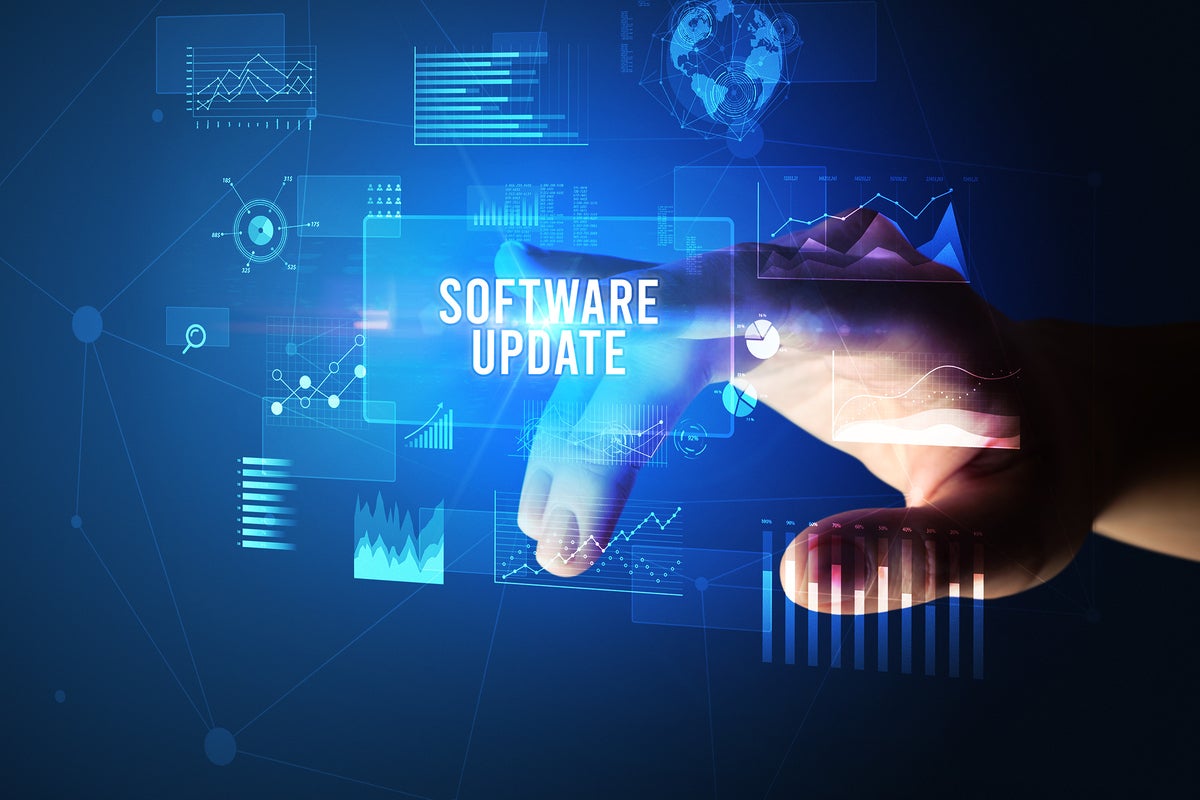 hand activates software update button in virtual interface development update patch fix by ra2studio gettyimages 1220938772 2400x1600 100854508 large