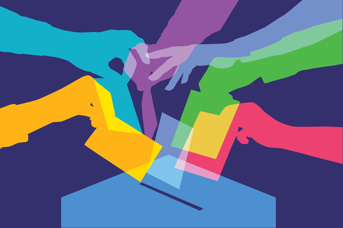Election / voting illustration  >  Multicolored hands enter ballots.
