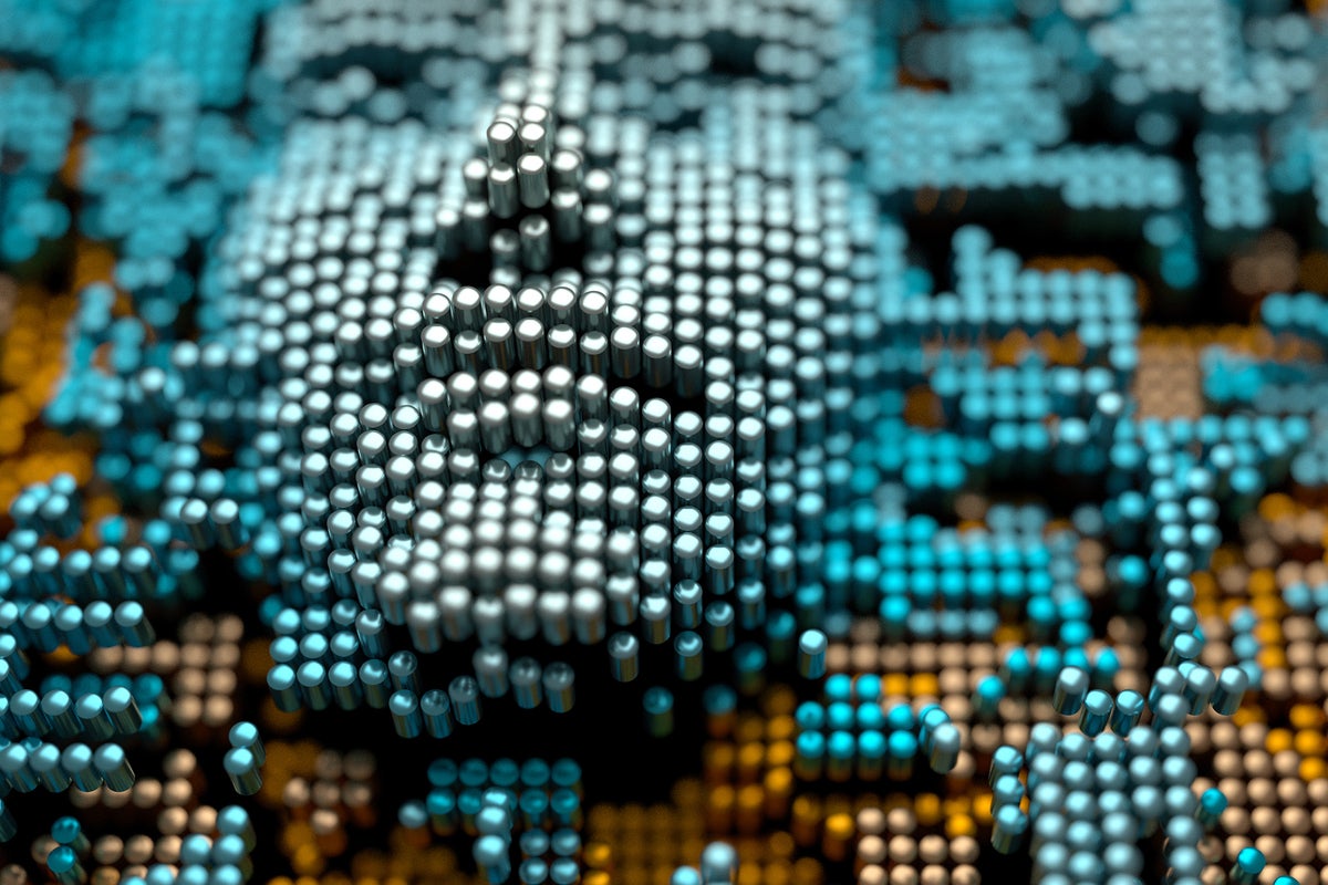 A human face emerges from an abstract virtual landscape of metallic cylinders.