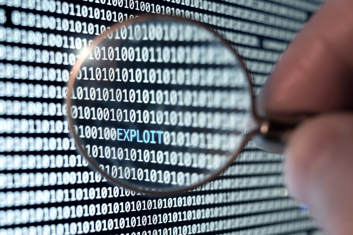 magnifying lens exposes an exploit amid binary code by mysteryshot gettyimages 940720534 2400x1600 100858615 large