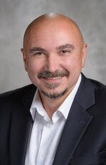 Mihai Strusievici, vice president of technology, global, Colliers International