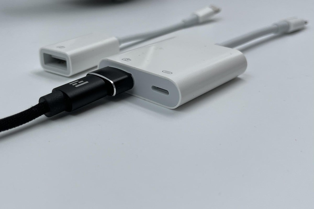 Detail view of how to connect to one of Apple’s ligntning to USB adapters.