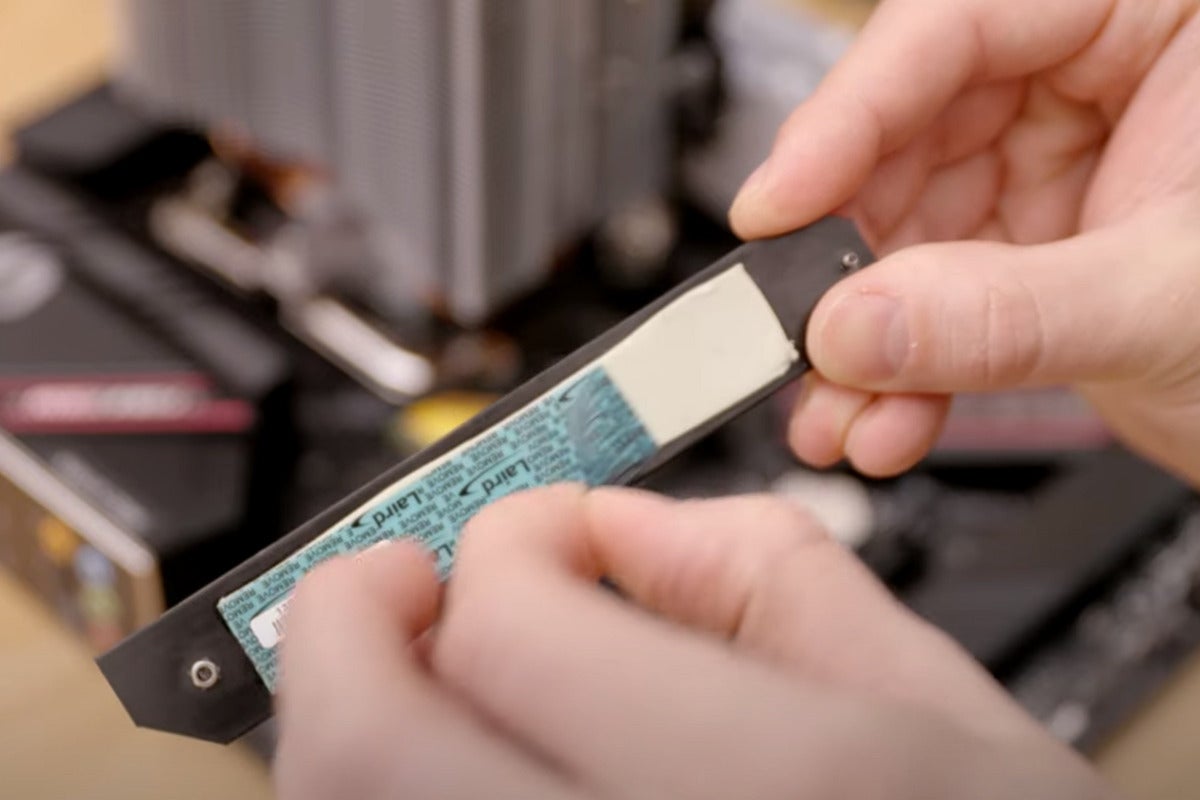 install ssd in pc remove plastic cover from thermal paste on shield